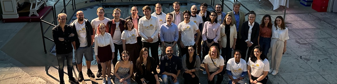 Group picture of the members of the SUNRISE project, posing in Reaktorhallen at KTH.